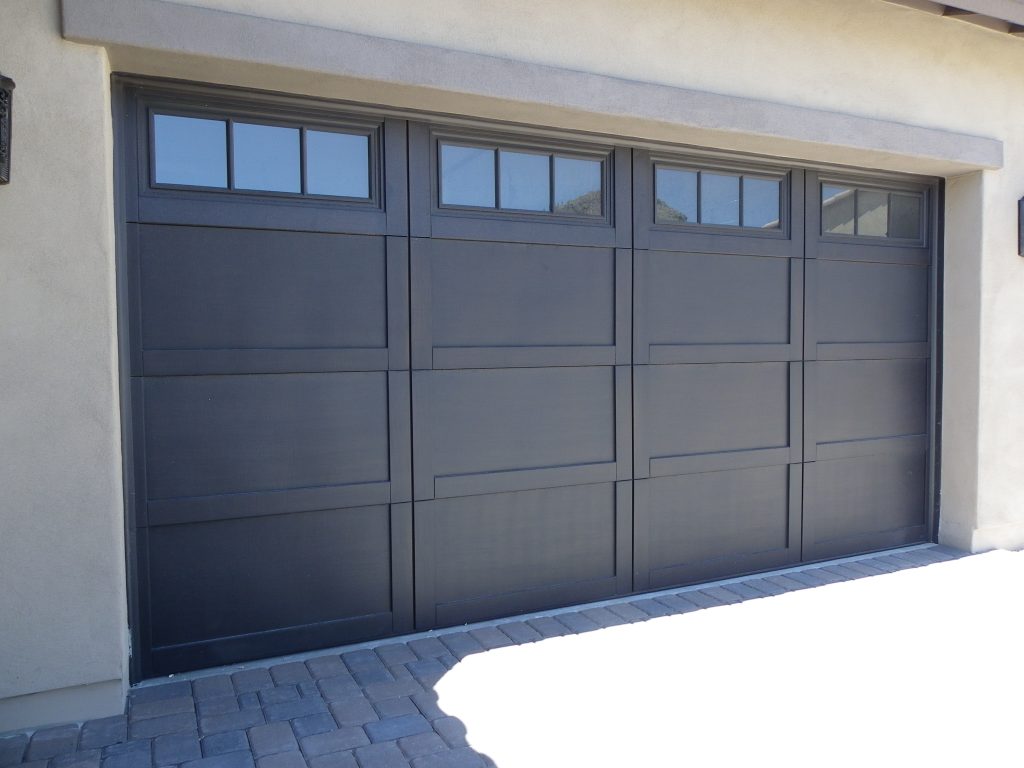 Double and single car garage SteelHouse Cascade C8 model 8'x8' with Optional Stockbridge Lites and Woodtone Finish