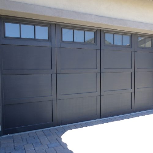 Double and single car garage SteelHouse Cascade C8 model 8'x8' with Optional Stockbridge Lites and Woodtone Finish