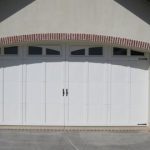 Double Car and Single Car Garage SteelHouse Andover A8 model 8'x8' with Optional Stockbridge Lites and Woodtone Finish