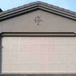 Double car garage door SteeLite Delano D1 model in wood grain texture