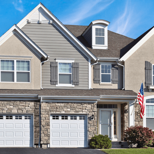 Double and single car garage doors Universal Series short panel in white with Sherwood lites